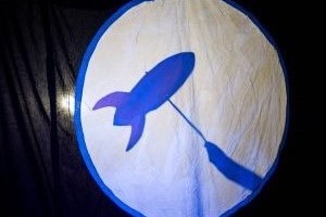 A spaceship shadow puppet.